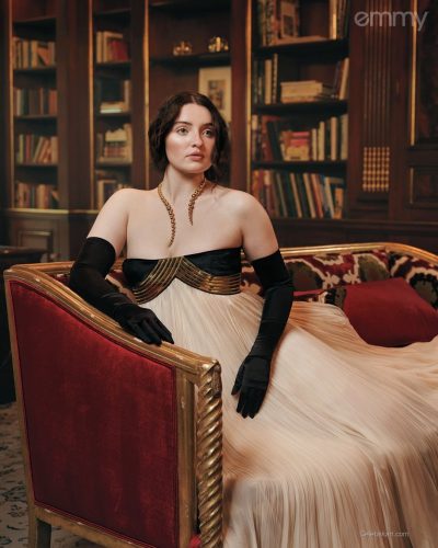 Lucy Halliday golden dress with luxurious warm hue