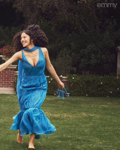 Lucy Halliday golden dress with shimmering embellishments