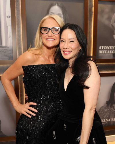 Lucy Liu in a classic black gown with diamond earrings