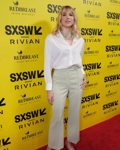 Lucy Punch wearing stylish look at premiere 2026