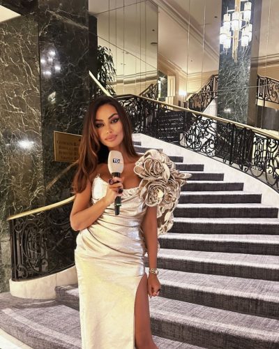 Madalina Ghenea chic black mesh dress fitting her curves