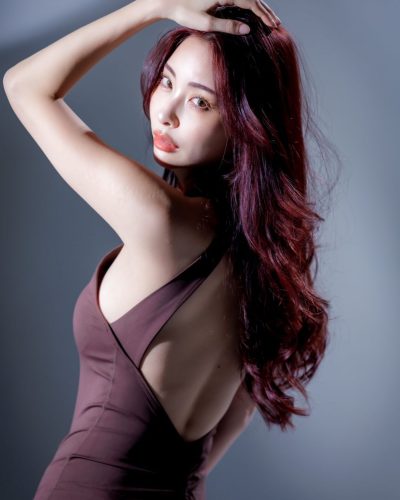 Makoto Minami brown bodysuit with high neck and zip closure