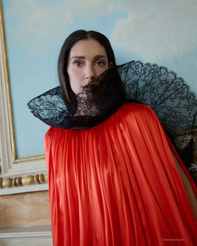 Maria Pedraza structured mint green top with orange skirt