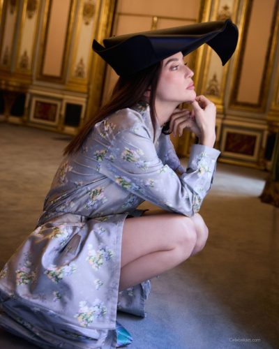 Maria Pedraza chic mint green top complemented by orange skirt