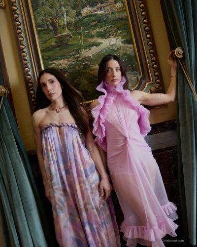 Maria Pedraza stylish mint green top and bright orange skirt