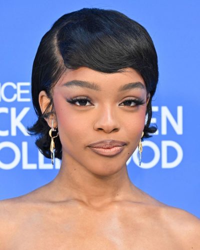 Marsai Martin in a stylish jumpsuit paired with oversized glasses