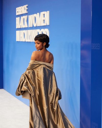 Marsai Martin sporting a strapless beige dress and burgundy footwear