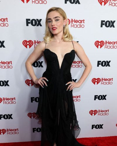 Meg Donnelly black gown with intricate details and flattering fit