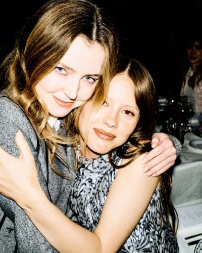 Mia Goth in soft pastel floral gown with playful motifs