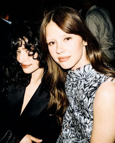 Mia Goth in delicate floral print gown with fitted silhouette