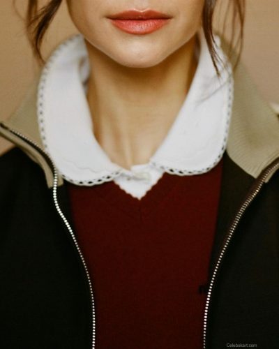 Nina Dobrev modern chic with burgundy top and black mini skirt