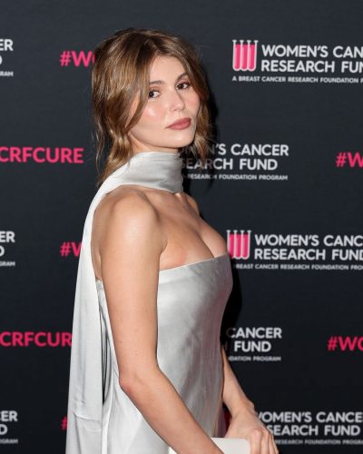 Olivia Jade silver gown featuring a chic scarf detail