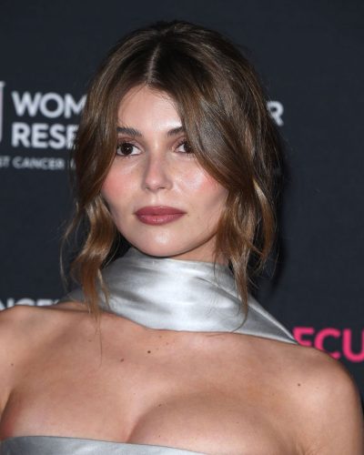 Olivia Jade minimalist silver dress with soft glow