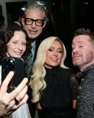 Paris Hilton stylish black heels complementing her black gown