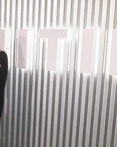 Paris Jackson sleek black gown with flowing fabric