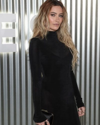 Paris Jackson black long-sleeve gown with minimalist accessories