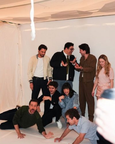 Lulu Wilson in warm pink sweater with textured design