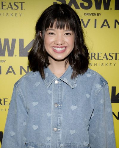 Peyton Elizabeth Lee with delicate silver necklace complementing her style