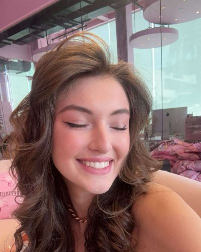 Rachel Pizzolato classy burgundy dress with playful elements