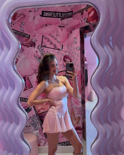 Rachel Pizzolato fitted burgundy dress featuring elegant neckline