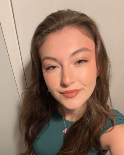 Rachel Pizzolato burgundy dress with playful cutout design