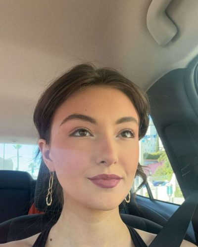 Rachel Pizzolato bold burgundy gown with unique design details