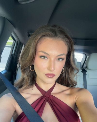 Rachel Pizzolato fitted burgundy dress featuring elegant neckline