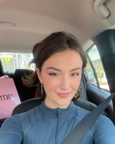 Rachel Pizzolato graceful burgundy dress complementing her complexion