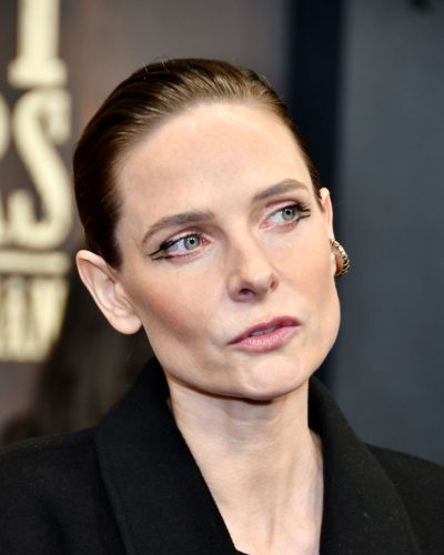 Rebecca Ferguson fashionable black gown with a focus on simplicity