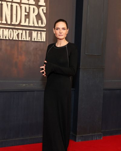 Rebecca Ferguson chic black dress with understated fashion choices