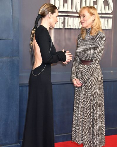 Rebecca Ferguson modern black gown featuring a streamlined silhouette