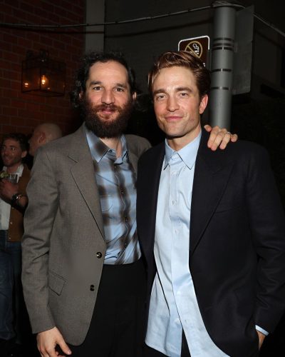 Robert Pattinson in stylish black blazer and light blue top