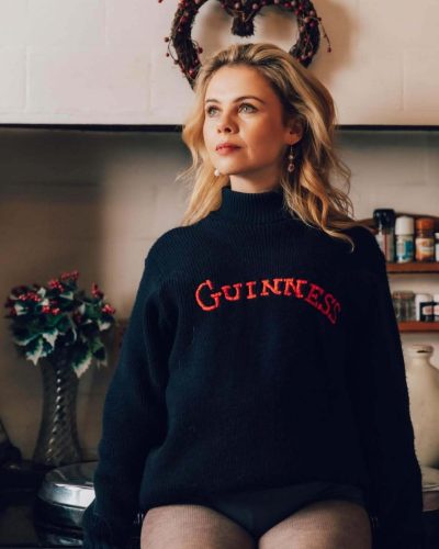 Saoirse-Monica Jackson tailored navy dress with flowing hair