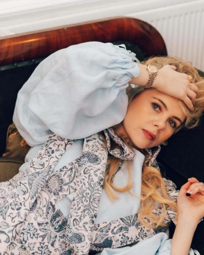 Saoirse-Monica Jackson stylish navy dress with eye-catching accents