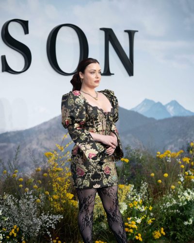 Shona McGarty dressed in a black jumpsuit with wide legs