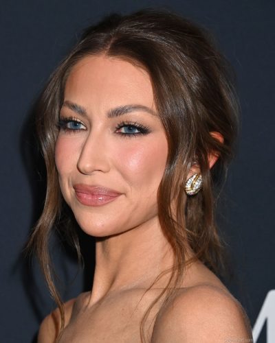 Stassi Schroeder with soft waves hairstyle and natural beauty palette.