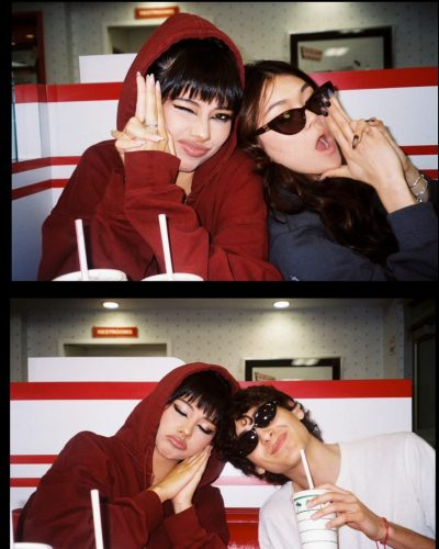 Xochitl Gomez in a chic black dress with fitted silhouette