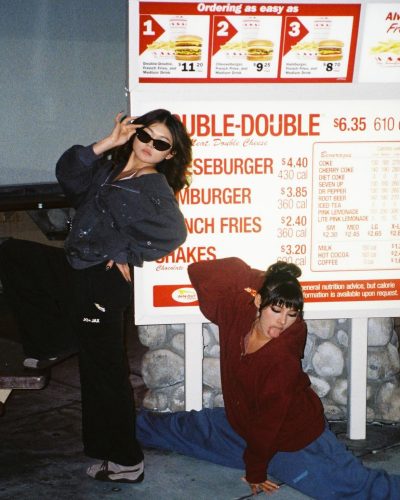 Xochitl Gomez in a contemporary black dress with ruffled details
