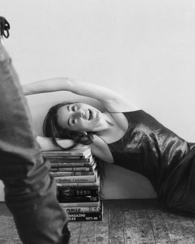 Alana Haim wearing a black dress complemented by minimal accessories.