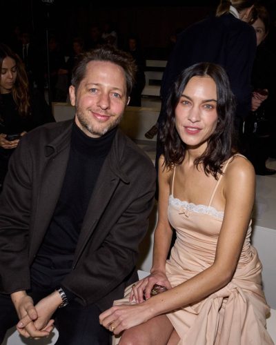 Alexa Chung in a timeless draped dress featuring lace details