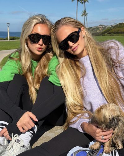 Alexa Serowik black crop top and black leggings on the beach.