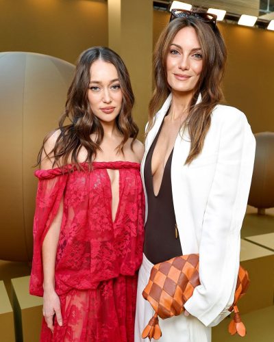 Alycia Debnam-Carey vibrant red dress featuring a deep V-neck