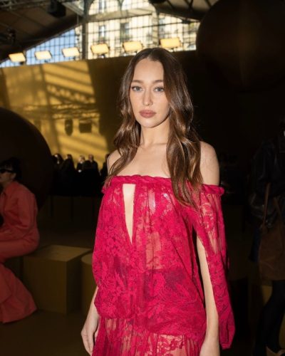 Alycia Debnam-Carey in eye-catching red lace dress with plunging neckline.