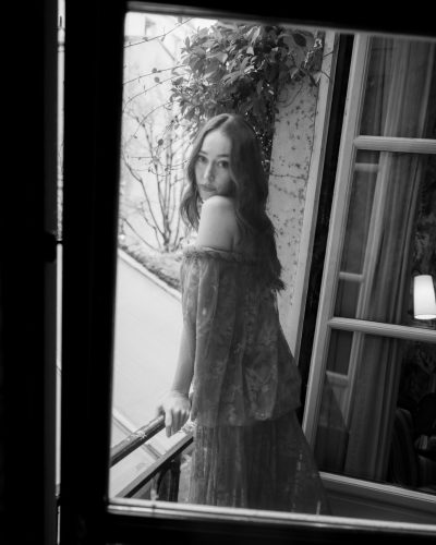 Alycia Debnam-Carey in red lace off-shoulder gown with plunging neckline.