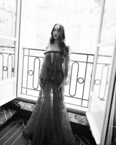 Alycia Debnam-Carey in sophisticated red lace gown accentuating her features.