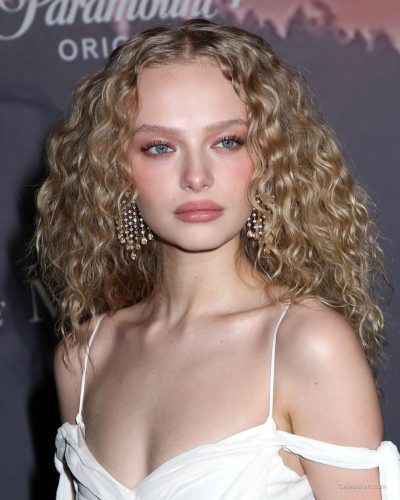 Amiah Miller spotted in white dress during premiere