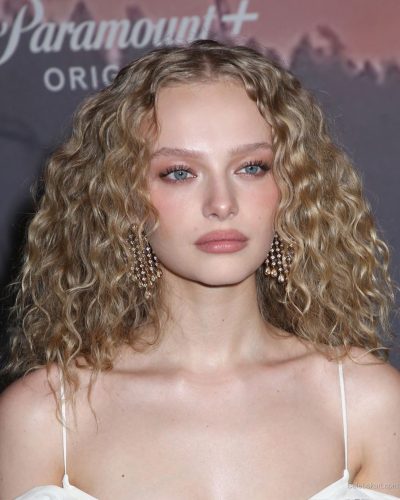 Amiah Miller wearing white dress at premiere 2023