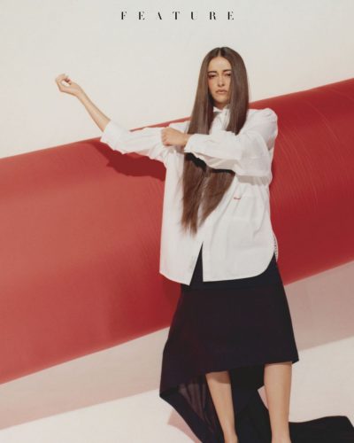 Ananya Panday in floral patterned flowing skirt and plaid jacket