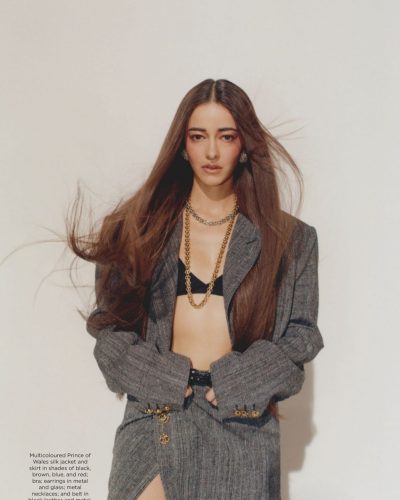 Ananya Panday with chic plaid jacket and colorful flowing skirt