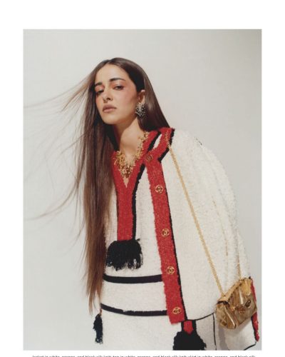 Ananya Panday wearing multicolored flowing skirt and statement earrings